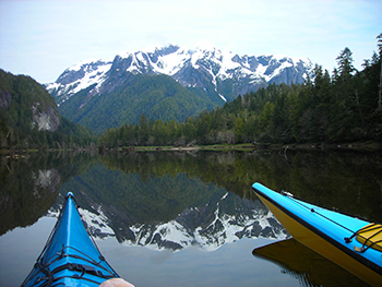 A view from a kayak of a lake in summer in Mackenzie, BC.