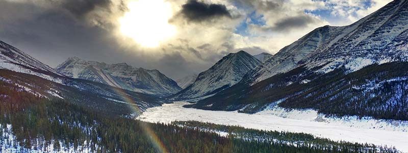 Snow covered mountains in the late day sunshine.