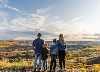 Family looking over a view point in Fort St. John