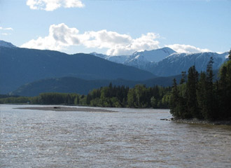 River and snow capped mountains.