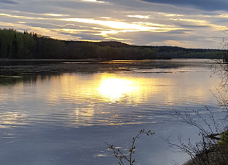 View of sunset on Stuart river near Vanderhoof